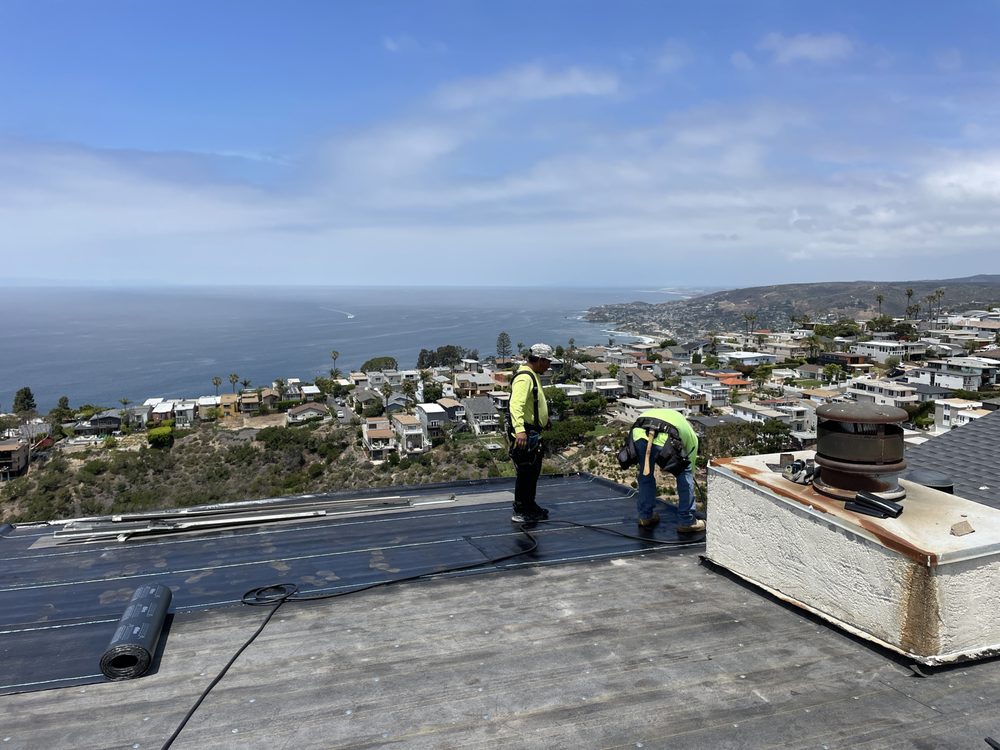 Slide of New Village Roofing