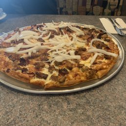 The garbage grinder pizza minus olives and green peppers. Excellent! The garbage grinder pizza minus olives and green peppers. Excellent!
