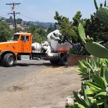 Diamond Concrete - Cemet truck backing down driveway. The cypress tree in front is what they broke. - Masonry/Concrete Near Me - Lakeside, California