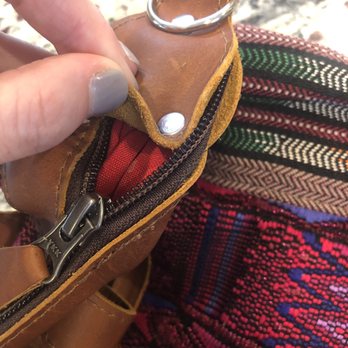 Quality Shoe Service Repairing - Zipper should end there but he sewed it into the river area. - Shoe Repair Near Me - Frederick, Maryland