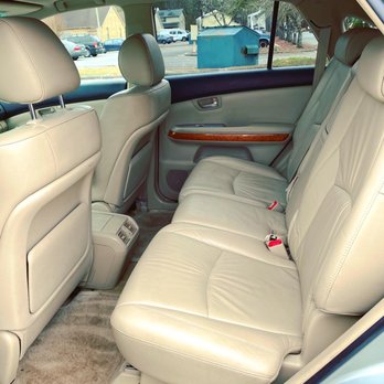 Tyson’s Detailing Service - The backseat area of my car after being detailed. The mats are still drying which is why they look a bit streaky. - Auto Detailing Near Me Tyson’s Detailing Service - The backseat area of my car after being detailed. The mats are still drying which is why they look a bit streaky. - Auto Detailing Near Me