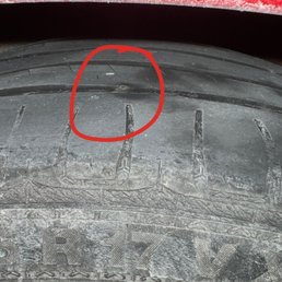 Nail in tire circled
