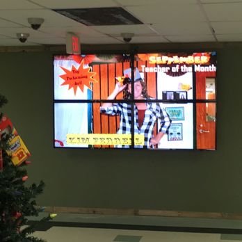 Athens Audio Video - A video wall using 4 flat panel displays provide information at a school campus. - Home Theatre Installation Near Me - MALAKOFF, Texas Athens Audio Video - A video wall using 4 flat panel displays provide information at a school campus. - Home Theatre Installation Near Me - MALAKOFF, Texas