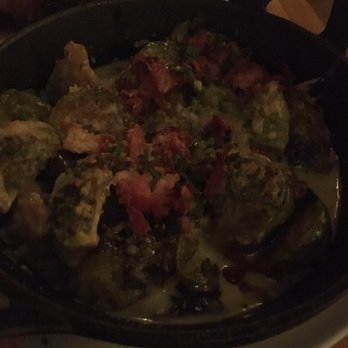 Grand Vin - Brussels sprouts in an insane cream sauce topped with cheese and bacon... yes please! - Wine Bars Near Me - Hoboken, New Jersey