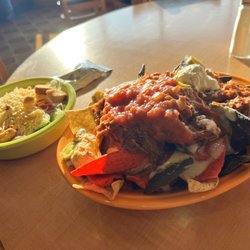 Woods & Waters - The Pork nachos is a huge portion easily shareable with your table!
