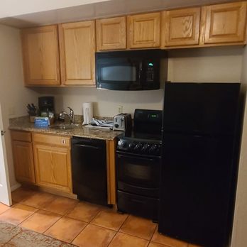 Club Wyndham Sedona - Small kitchen includes: pots, pans, cooking and baking utensils, dishwasher and electric stove. - Hotels Near Me - Sedona, Arizona