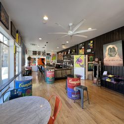 Oli Gallery - Wine Bar. Cheers to art! Have a wonderful glass of Equality Wine in our wine bar gallery space.