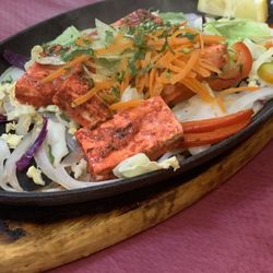 New Delhi Indian Restaurant - Uncooked paneer sold as cooked in a tandoor oven. Con men.