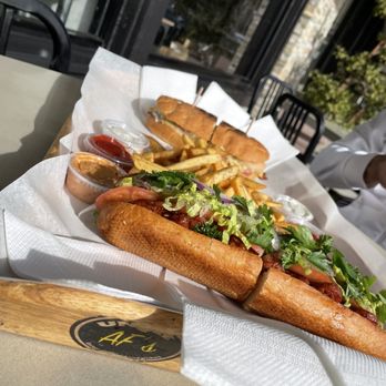Uncle Af's - Persian Gulf Bandari Sandwich (bottom) and LA Rams Sandwich (top). BOTH INCREDIBLE!! Fries also insanely good!! - Sandwiches Near Me - Agoura Hills, California Uncle Af's - Persian Gulf Bandari Sandwich (bottom) and LA Rams Sandwich (top). BOTH INCREDIBLE!! Fries also insanely good!! - Sandwiches Near Me - Agoura Hills, California
