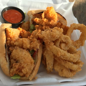 Uptown Scratch Kitchen - Shrimp po' boy with house-made onion rings and secret BBQ sauce - Food Trucks Near Me - Saint Augustine, Florida