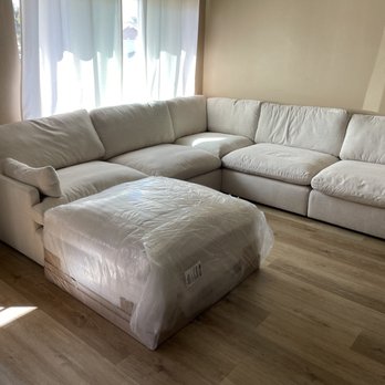 Ashley Store - Wrapped ottoman that they won't accept - Furniture Stores Near Me - Long Beach, California