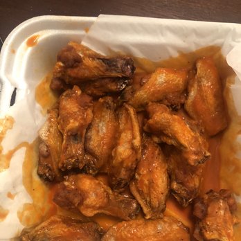 Awesome Wings - a tray of chicken wings with sauce - Chicken Wings Near Me - Toledo, Ohio Awesome Wings - a tray of chicken wings with sauce - Chicken Wings Near Me - Toledo, Ohio