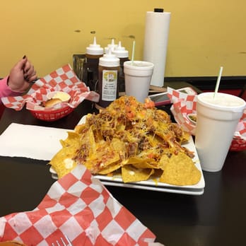 The Pompous Pig - The massive nachos! - Barbeque Near Me - Anderson, South Carolina