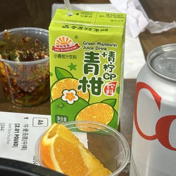YGF Malatang - Complimentary orange slices & purchased green mandarin juice drink and Diet Coke - Noodles Near Me - Milpitas, California YGF Malatang - Complimentary orange slices & purchased green mandarin juice drink and Diet Coke - Noodles Near Me - Milpitas, California