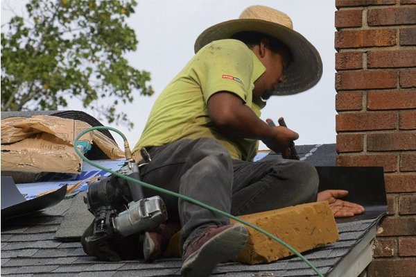 Slide of Lake Travis Roofing