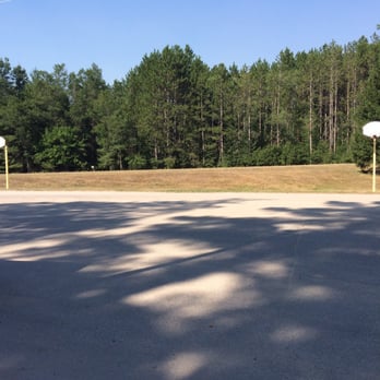 Alcona Park - Two basketball hoops by the entrance. - Parks Near Me - Glennie, Michigan