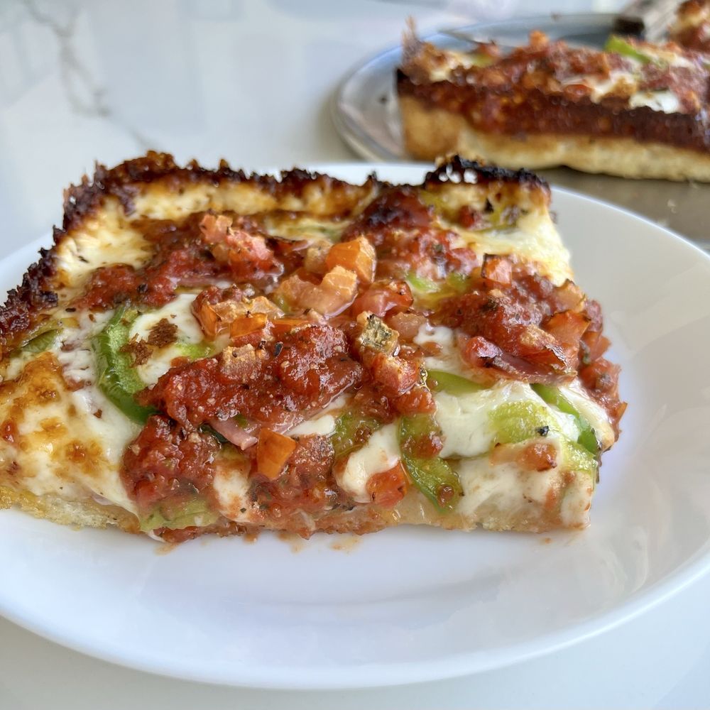 Fuji & Vi's - Cross-section of a slice of the Santiglia pizza - Pizza Near Me - Pasadena, California Fuji & Vi's - Cross-section of a slice of the Santiglia pizza - Pizza Near Me - Pasadena, California