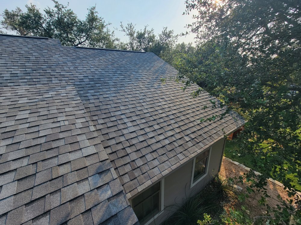 Slide of Tux Roofing