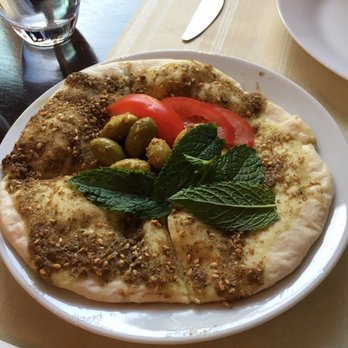 Layaly Beirut ليالي بيروت - Bonus pita with olives mint and tomatoes with spices - Arabic Near Me - Interlaken, BE