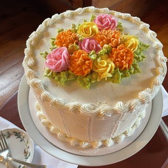 Salem Cross Inn - Red velvet wedding cake with buttercream frosting and beautiful icing flowers. - Venues & Event Spaces Near Me - West Brookfield, Massachusetts