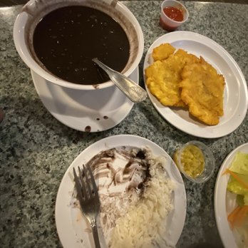 Boater's Grill - Flavorless Black bean soup and undercooked white rice with tostones - Seafood Near Me - Key Biscayne, Florida Boater's Grill - Flavorless Black bean soup and undercooked white rice with tostones - Seafood Near Me - Key Biscayne, Florida