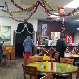Seven people waiting inside and four waiting outside.