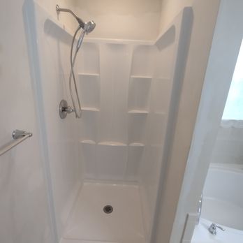 AKM Construction - a bathroom with a shower and toilet - Landscaping Near Me AKM Construction - a bathroom with a shower and toilet - Landscaping Near Me