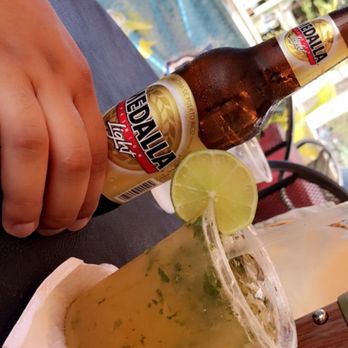 The Reef Bar - Mojito de Parcha (passion fruit Mojito) and an ice cold Medalla - Bars Near Me - Pinones, Puerto Rico The Reef Bar - Mojito de Parcha (passion fruit Mojito) and an ice cold Medalla - Bars Near Me - Pinones, Puerto Rico