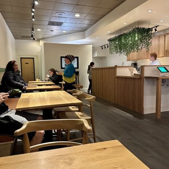 Yuginong - people sitting at tables in a restaurant - Korean Near Me - Portland, Oregon