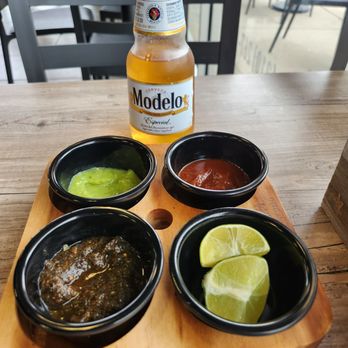 Tacos Don Manolito - 3 different sauces and lime, with Modelo Especial - Tacos Near Me - San Antonio, Texas Tacos Don Manolito - 3 different sauces and lime, with Modelo Especial - Tacos Near Me - San Antonio, Texas