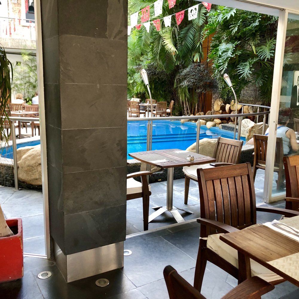 Coexistbistro - Poolside seating - VN - Seafood Near Me - Puerto Vallarta, JAL Coexistbistro - Poolside seating - VN - Seafood Near Me - Puerto Vallarta, JAL