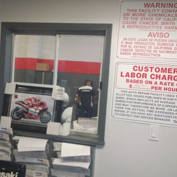 Wheels In Motion - In a hurry? Service man Dale rolls up his sleeves and gets dirty for ya while taking calls and helping @ the counter. - Motorcycle Dealers Near Me - Chatsworth, California