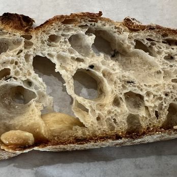Tommy and Atticus - Rosemary Garlic Country Loaf bread slice - Bakeries Near Me - Redondo Beach, California Tommy and Atticus - Rosemary Garlic Country Loaf bread slice - Bakeries Near Me - Redondo Beach, California