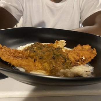 Hook & Barrel - Fried flounder over grits with tomato gravy - Seafood Near Me - Myrtle Beach, South Carolina