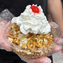 Valley Villa Custard - The Lion! Vanilla Custard with Crumbled Pretzels smothered in sweet salted Carmel Sauce topped with whip cream and a cherry on top!