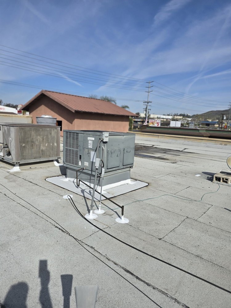 Slide of Tecun’s Roofing
