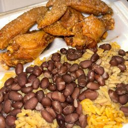 a plate of beans and fried chicken a plate of beans and fried chicken