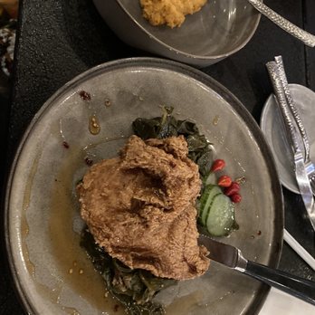 Heirloom - A Milltown Eatery - Fried chicken with collar greens and side dish as sweet potatoes - New American Near Me - Spartanburg, South Carolina