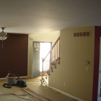 Performance Painting - The living room of a Troy residence. - Painters Near Me - Clawson, Michigan
