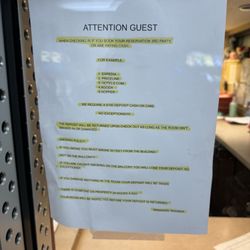 Red Roof Inn Philadelphia - Oxford Valley - Additional disclosures taped to the bulletproof glass