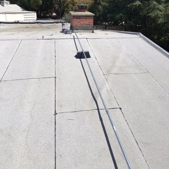 Spingola Electric - Pipe run on an Eichler roof for split system AC units. - Electricians Near Me - Concord, California