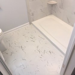 Penfield Plumbing & Heating - Tile flooring replaced