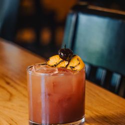 Pine House Kitchen & Bar - Smokey Peach!
 DEL MAGUEY VIDA MEZCAL, BULLEIT BOURBON, PEACH PUREE, AND CHERRY SYRUP, WITH A DELIGHTFUL HINT OF SMOKINESS.