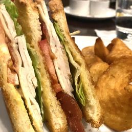 Turkey club and unique French fries Turkey club and unique French fries