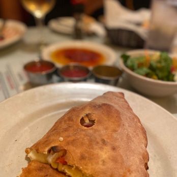 Pulcinella's Italian Restaurant - Calzone w/ sausage and pepperoni plus ricotta - Italian Near Me - Durham, North Carolina