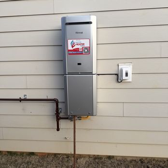 Water Heater Experts - Exterior Rinnai tankless water heater with pipe cover - Water Heater Installation/Repair Near Me - Mooresville, North Carolina Water Heater Experts - Exterior Rinnai tankless water heater with pipe cover - Water Heater Installation/Repair Near Me - Mooresville, North Carolina