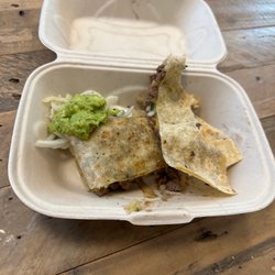 A picture of my corn tacos with no onions.