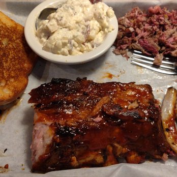 'Cue - The Half-rack Baby back Ribs with Chopped Pork, Deviled Egg Potato Salad, Brunswick Stew, and two slices of Texas Toast + Sweet Tea. - Barbeque Near Me - Cumming, Georgia 'Cue - The Half-rack Baby back Ribs with Chopped Pork, Deviled Egg Potato Salad, Brunswick Stew, and two slices of Texas Toast + Sweet Tea. - Barbeque Near Me - Cumming, Georgia
