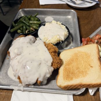The Purple Goat - Chicken fried chicken, mashed potatoes, and green beans. - Sports Bars Near Me - Stephenville, Texas The Purple Goat - Chicken fried chicken, mashed potatoes, and green beans. - Sports Bars Near Me - Stephenville, Texas