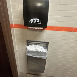 Dunkin' - Air dryer broken- paper towels piled up